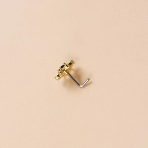 20G gold-plated stainless steel L-shaped nose stud featuring a black zircon stone accent