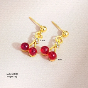 Red cherry earrings with sparkling crystals and golden leaves in a sleek minimalist design