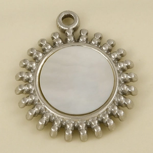 Detailed close-up of 304 stainless steel sun pendant with white shell inlay and gear edges