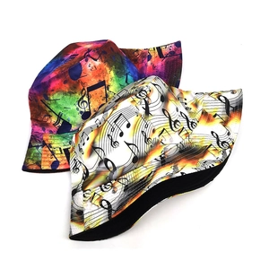 Detail of vibrant music notes and treble clef patterns on a stylish bucket hat fabric