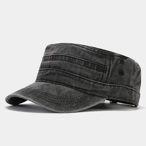 Detail view of washed vintage military cap featuring reinforced stitching and breathable eyelets