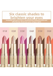 Matrix display of six dual-color glitter eyeshadow sticks with shimmering golden packaging