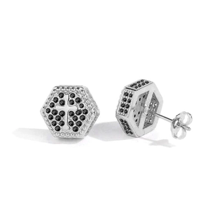 Macro view of a hexagonal cross earring with pave black zircon and silver metallic details