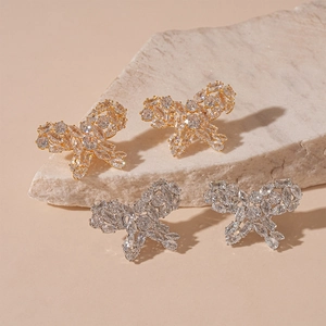 Exquisite gold and silver butterfly stud earrings with micro-pave white zircon crystals