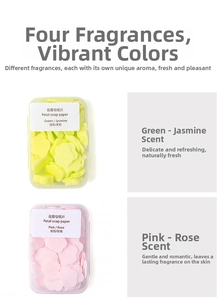 Detail view of portable petal-shaped soap sheets in jasmine and rose cases for travel