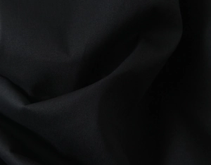 Detailed close-up showing the premium black fabric texture and pleated material finish