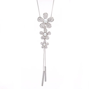 Elegant silver flower necklace with white pearls and crystals on a pure white backdrop