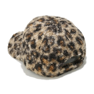 Detail view of leopard print faux fur baseball cap showing plush texture and back strap