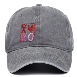 Vintage washed dark grey baseball cap featuring red XOXO heart embroidery on crown