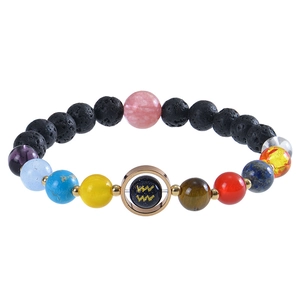 Aquarius zodiac blue sandstone and volcanic stone beaded bracelet with gold accents