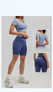 Detailed view of high-elasticity two-piece yoga set with crop top and biker shorts