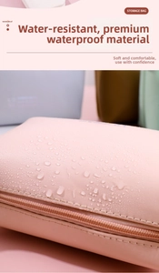 Macro detail of waterproof pink PU leather surface with water droplets on travel makeup bag