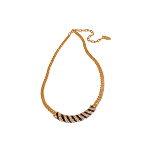 Gold-tone chunky necklace with classic stripes and sparkling crystals on white background