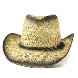 Detail showing hand-woven hollow diamond pattern on a vintage western straw cowboy hat
