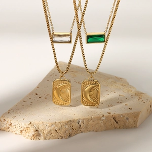 Double-layered stainless steel necklace with gold moon and green zircon rectangle pendants