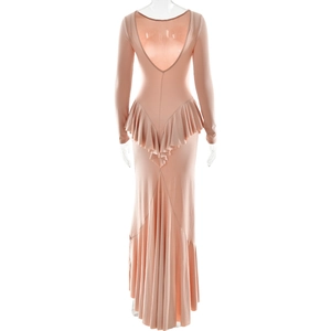 Detail of pink backless maxi dress featuring elegant ruffle waist and pleated floor-length hem