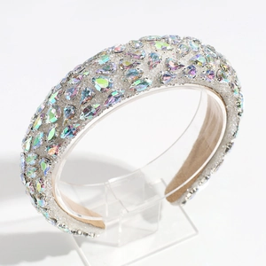 Close-up of a Baroque headband featuring rainbow rhinestones on a silver alloy base