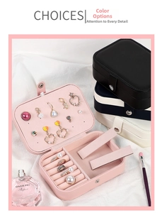 Detailed interior of portable multi-color leather jewelry box with functional compartments
