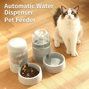 Gray and white automatic pet gravity waterer and feeder set on wooden floor with ragdoll cat