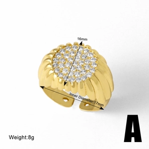 Detail view of gold zircon ring showing 16mm top diameter and 17mm inner diameter