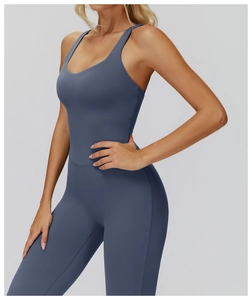 Close-up of dark grey-blue yoga bodysuit showing high-stretch fabric and slim fit design