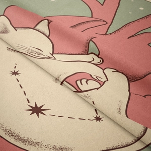 Detailed close-up of retro cat and constellation pattern on soft woven tapestry fabric
