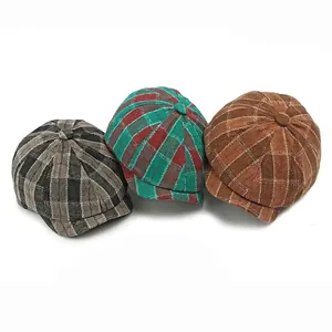 Classic plaid newsboy caps for women and men in black, red, and brown wool fabric