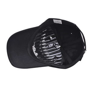 Detail of 100% cotton baseball cap interior with stitching and adjustable strap