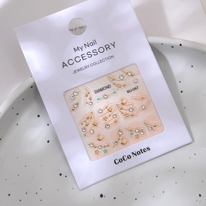 Detail of MJ-047 nail art stickers with gold star constellations and tiny K9 crystals