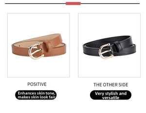 Close-up of black and brown PU leather belts with gold horseshoe metal buckles