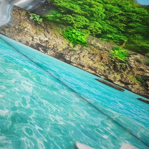 Macro detail of microfiber fabric texture showing vibrant digital landscape printing