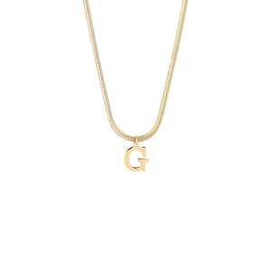 Detail of 18K gold-plated stainless steel snake chain with a capital G letter pendant