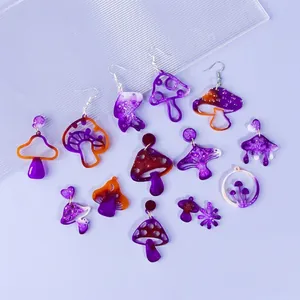 Detailed view of DIY resin mushroom earrings made from handmade silicone molds