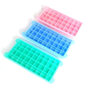 Stack of 48-cavity ice cube trays with lids in pink, blue, and green for home DIY