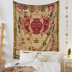 Close-up of bohemian tarot tapestry with sun moon faces and celestial symbols in a bedroom