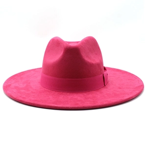 Detail of rose pink wide brim felt hat featuring matching satin ribbon and side bow accent