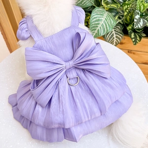Detail of lavender pet wedding dress showing large bow, metal D-ring and layered skirt
