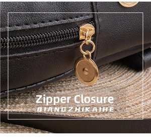 Close-up of premium black leather backpack featuring smooth golden metal zipper closure