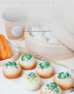 Detailed macro view of realistic PVC fried dumplings with sesame and scallion garnishes