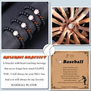 Detailed view of matte black bead baseball bracelet with heart touching message card