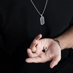 Men's stainless steel jewelry set featuring a rectangle pendant necklace and chain bracelet