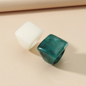 Minimalist square resin ring set featuring white and emerald marble textures