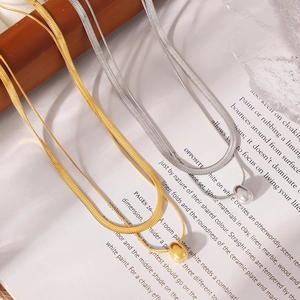 Minimalist snake chain necklace with water drop pendant in gold and silver finish
