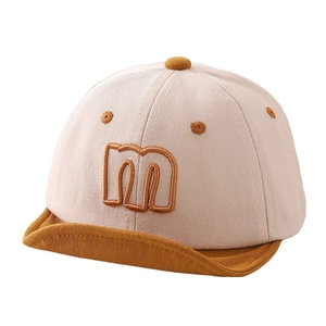 Toddler minimalist baseball cap with soft brim and yellow letter m embroidery in beige