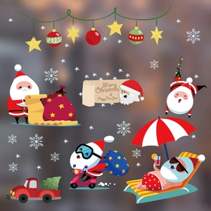 Christmas static window stickers featuring cartoon Santa Claus and red truck decals