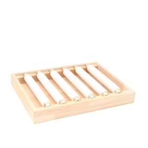 Wood ring display tray with six white padded cylinders for professional jewelry presentation