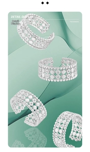 Macro detail of S925 sterling silver ring with hexagonal cutout and micro-set stones