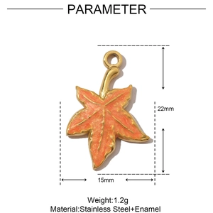 Detail view of orange enamel maple leaf pendant with size dimensions and stainless steel material