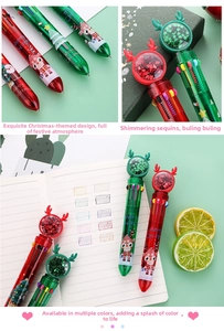 Detailed view of Christmas multi-color pens with reindeer sequins and festive prints