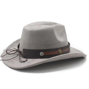 Detail of grey suede cowboy hat featuring brown leather band with star studs and turquoise